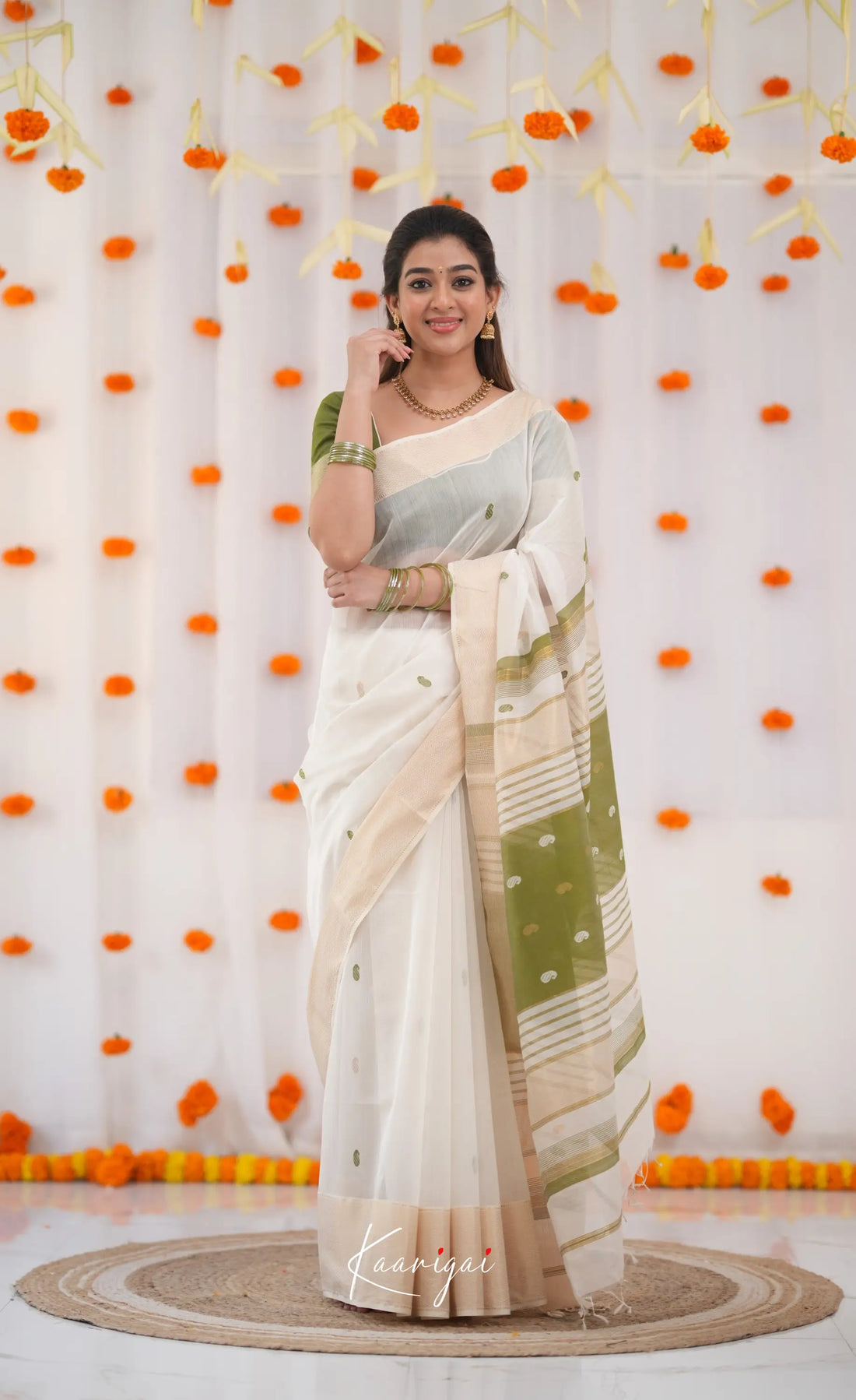 Maanvi Maheswari Silk Cotton Saree - White and Olive Green Sarees