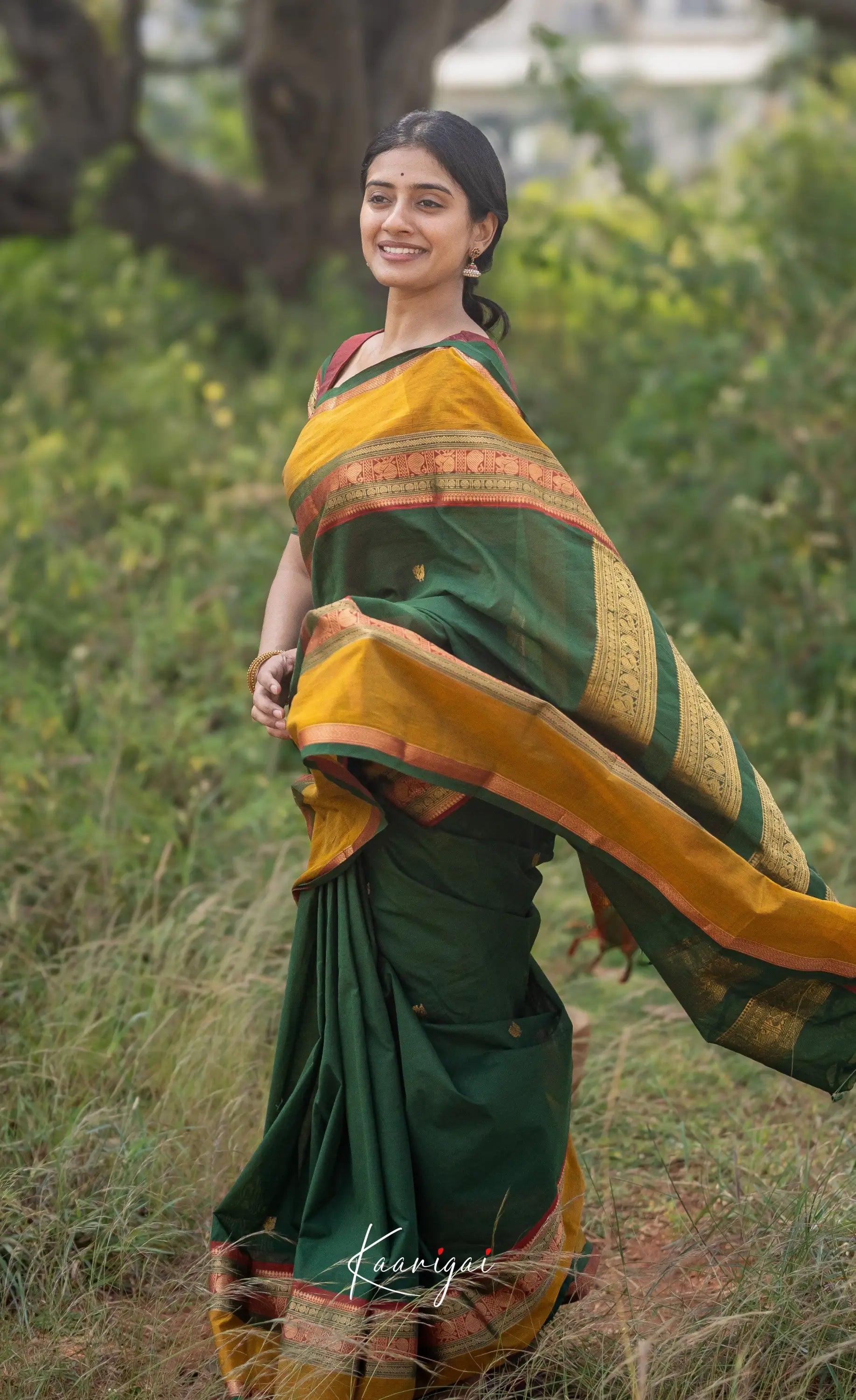 Kamakshi Bottle Green Tone And Mustard Shade Sarees