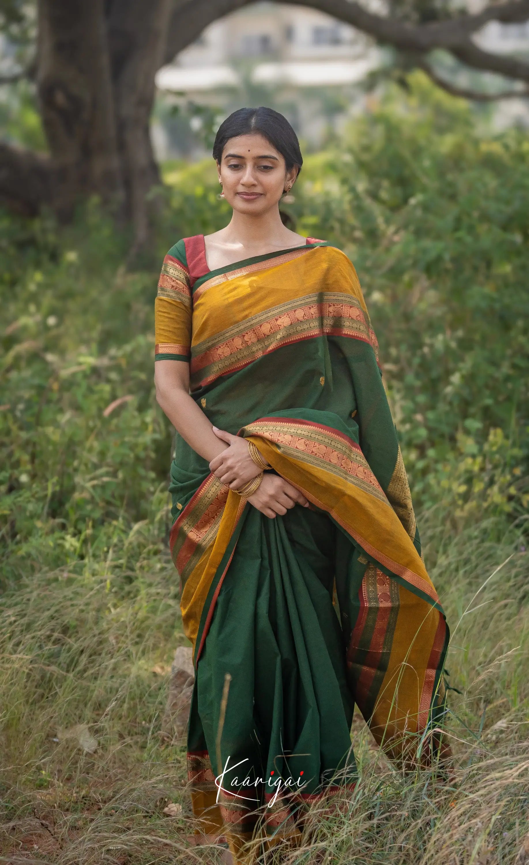 Kamakshi Bottle Green Tone And Mustard Shade Sarees