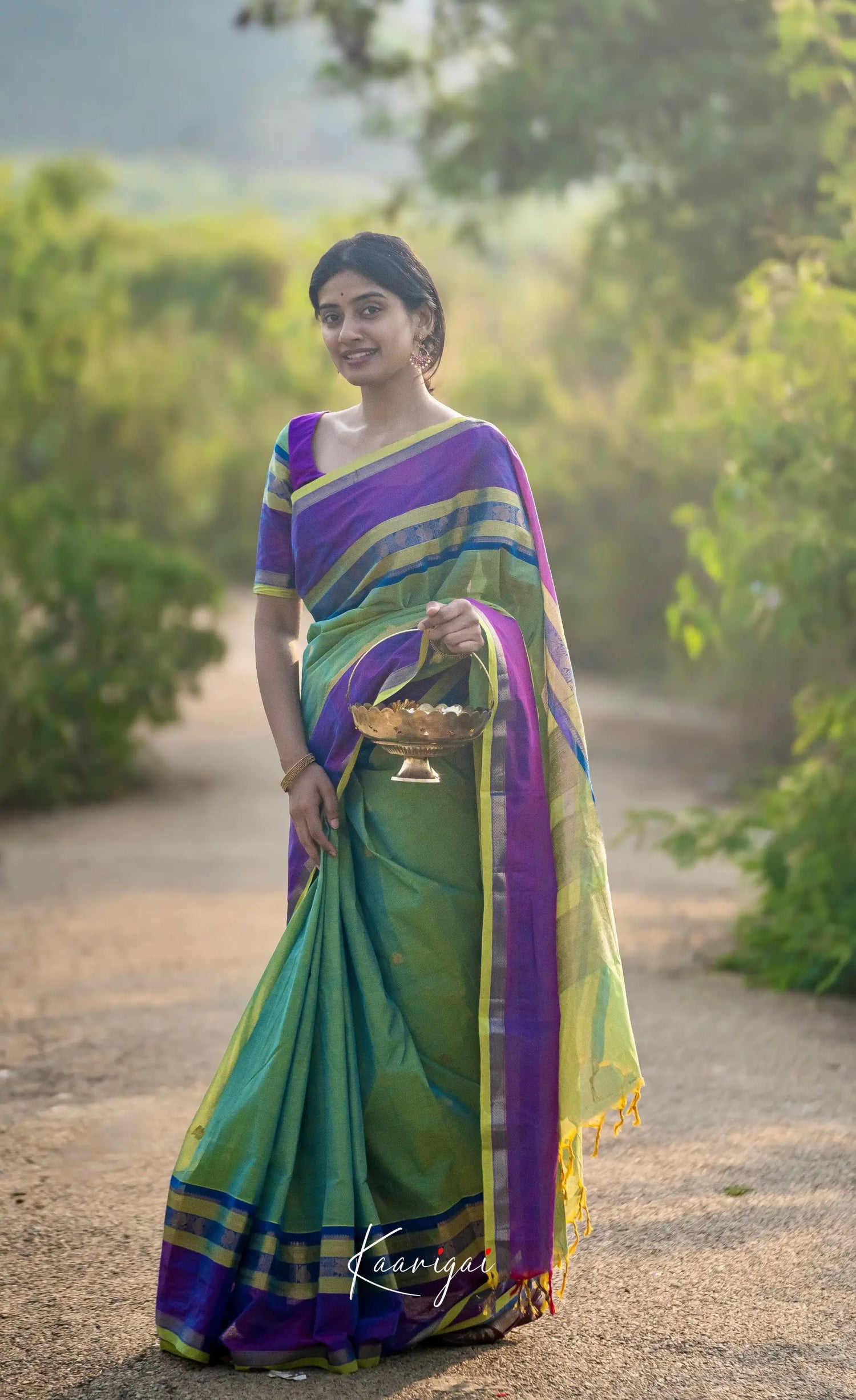 Kamakshi Green Tone And Purple Shade Sarees