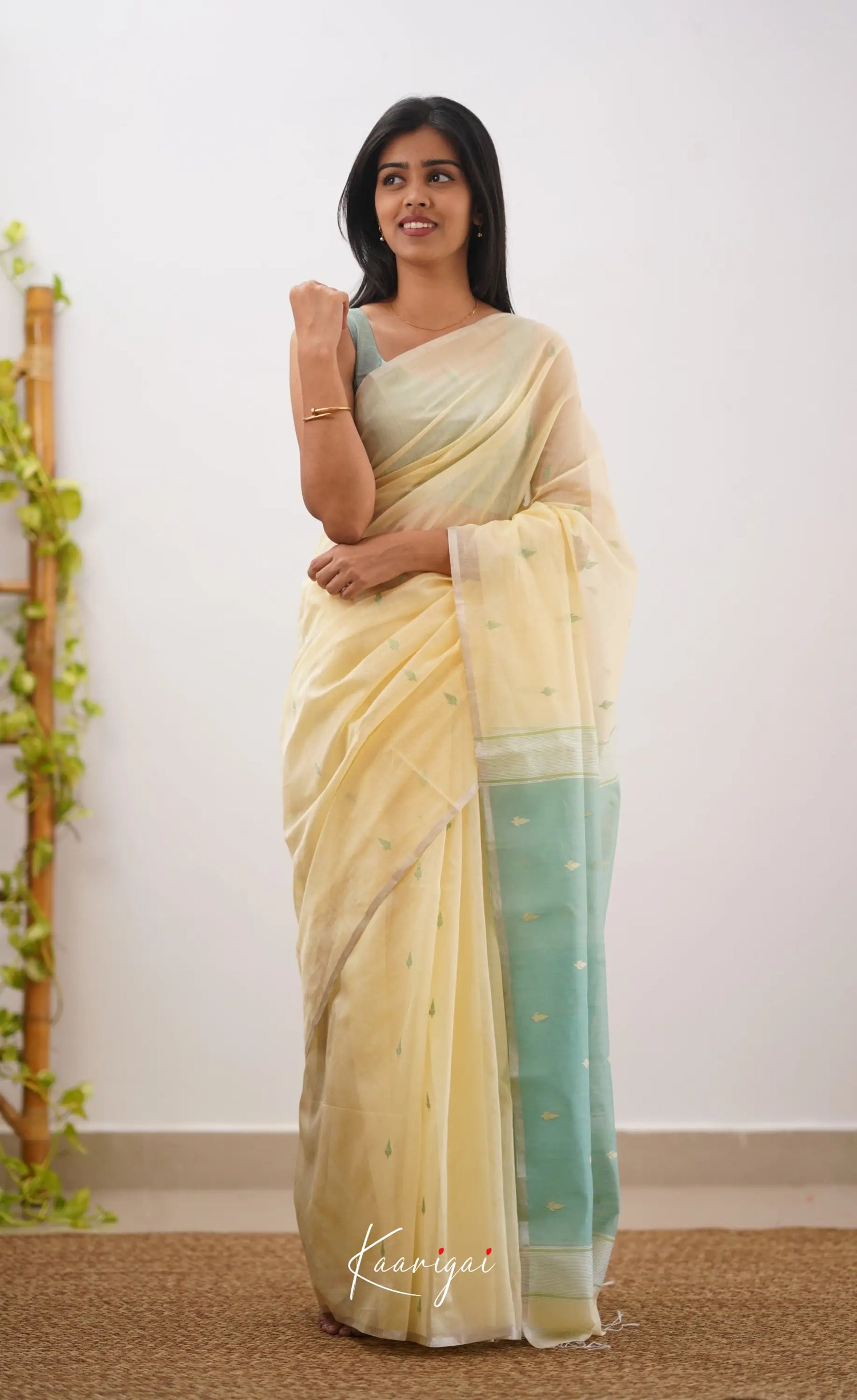 Aadrika- Cream And Light Teal Pure Maheshwari Silk Cotton Saree Sarees