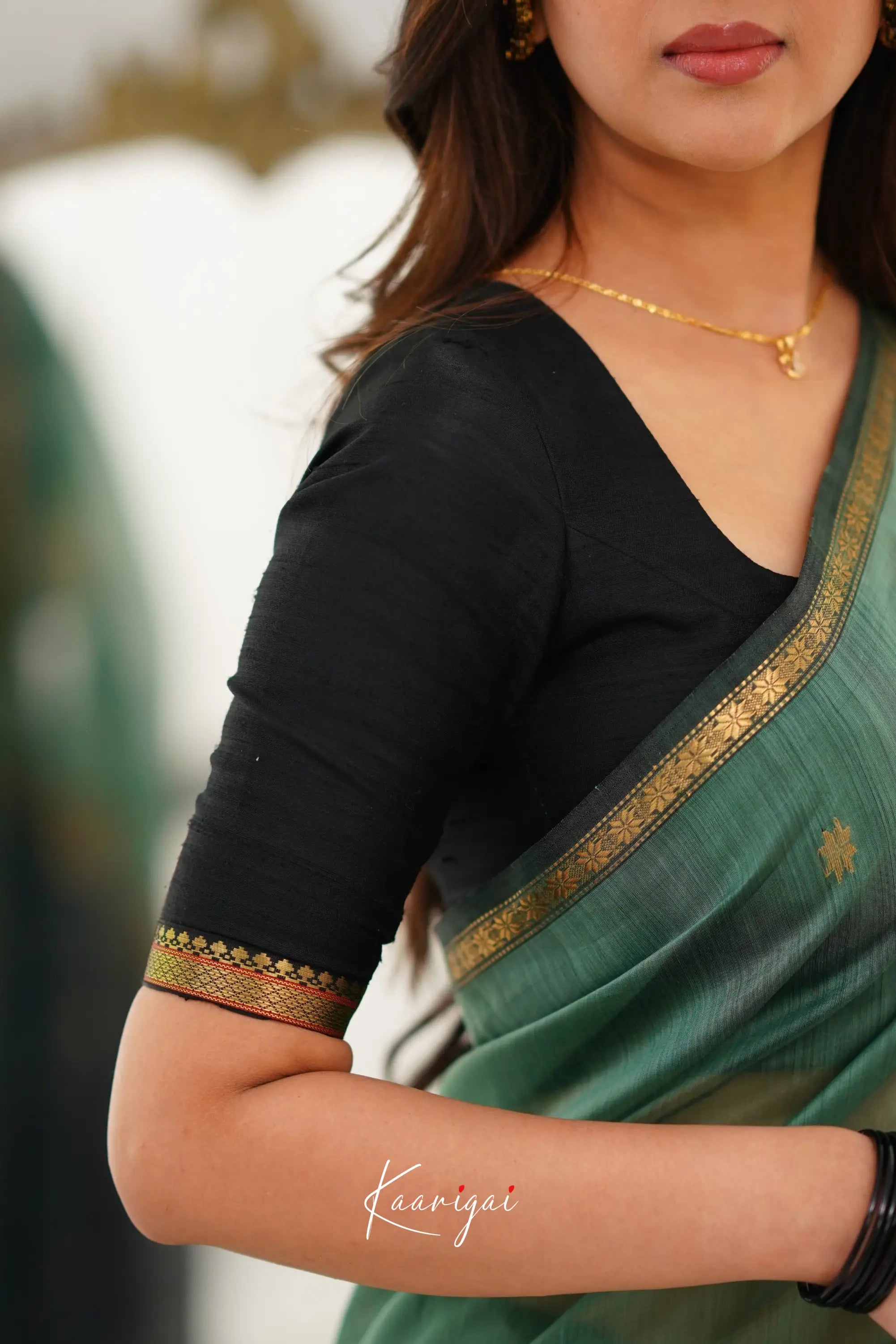 Maanvi Maheswari Silk Cotton Saree - Dull Teal Green And Black Sarees