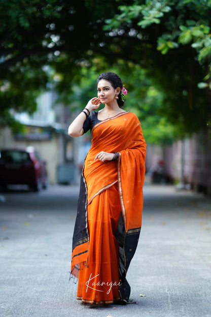 Maanvi Maheswari Silk Cotton Saree - Orange And Black Sarees