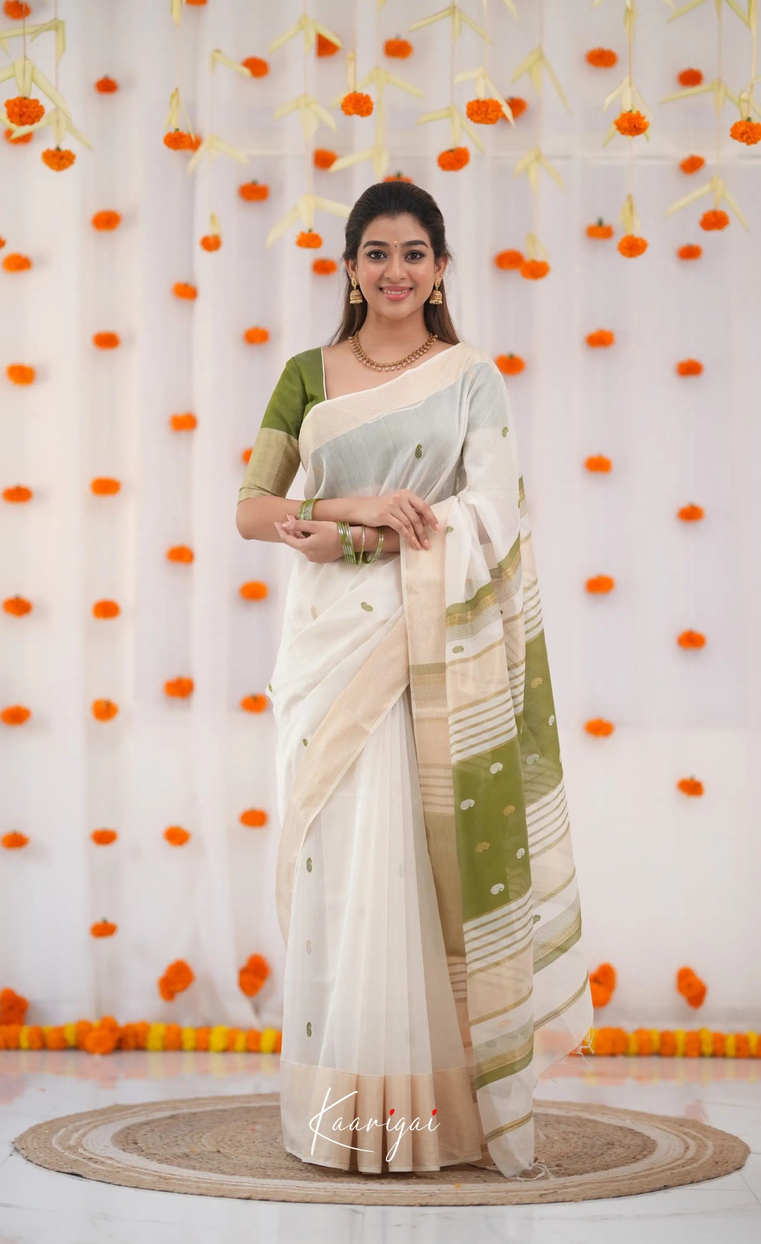 Maanvi Maheswari Silk Cotton Saree - White and Olive Green Sarees