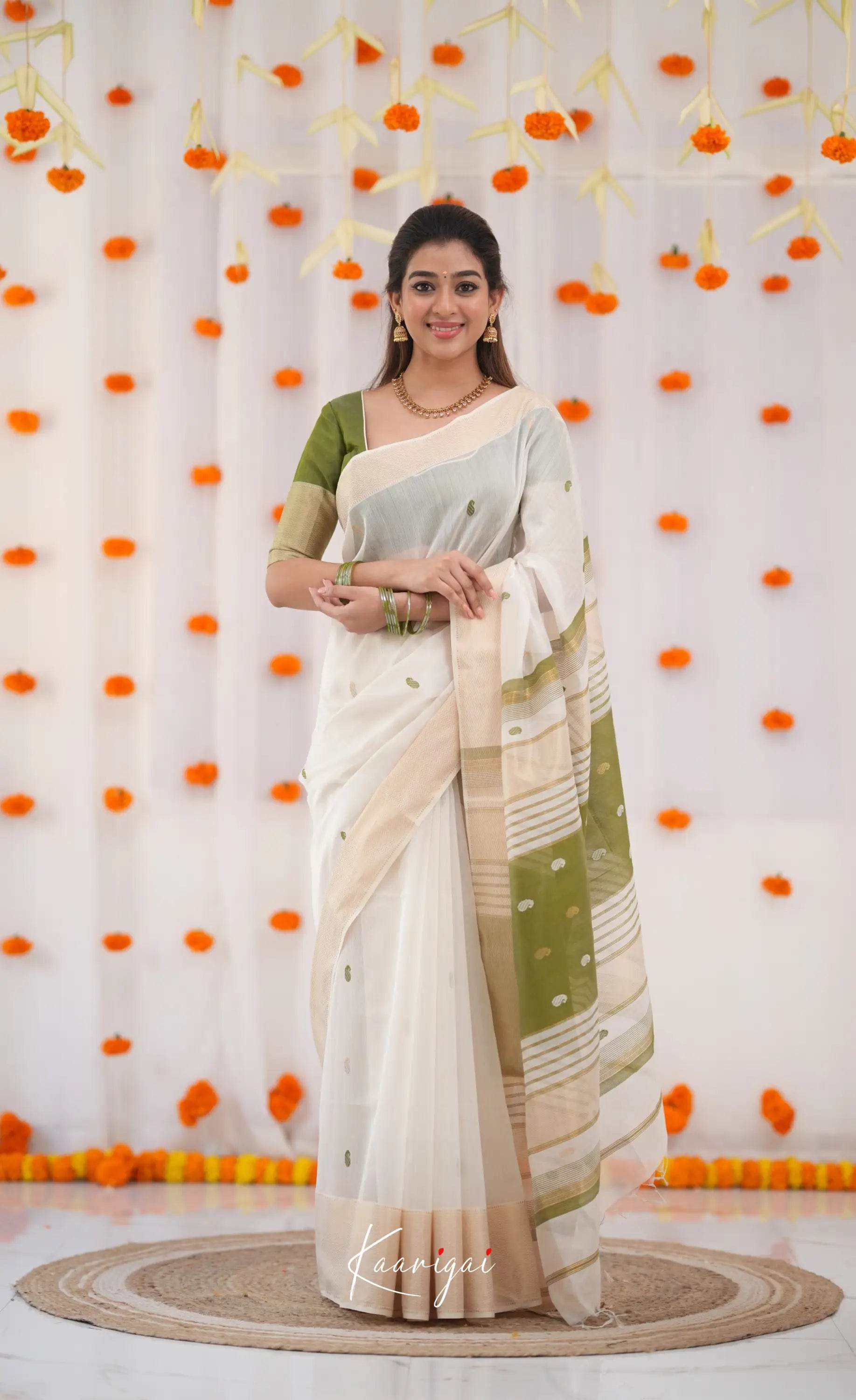 Maanvi Maheswari Silk Cotton Saree - White and Olive Green Sarees