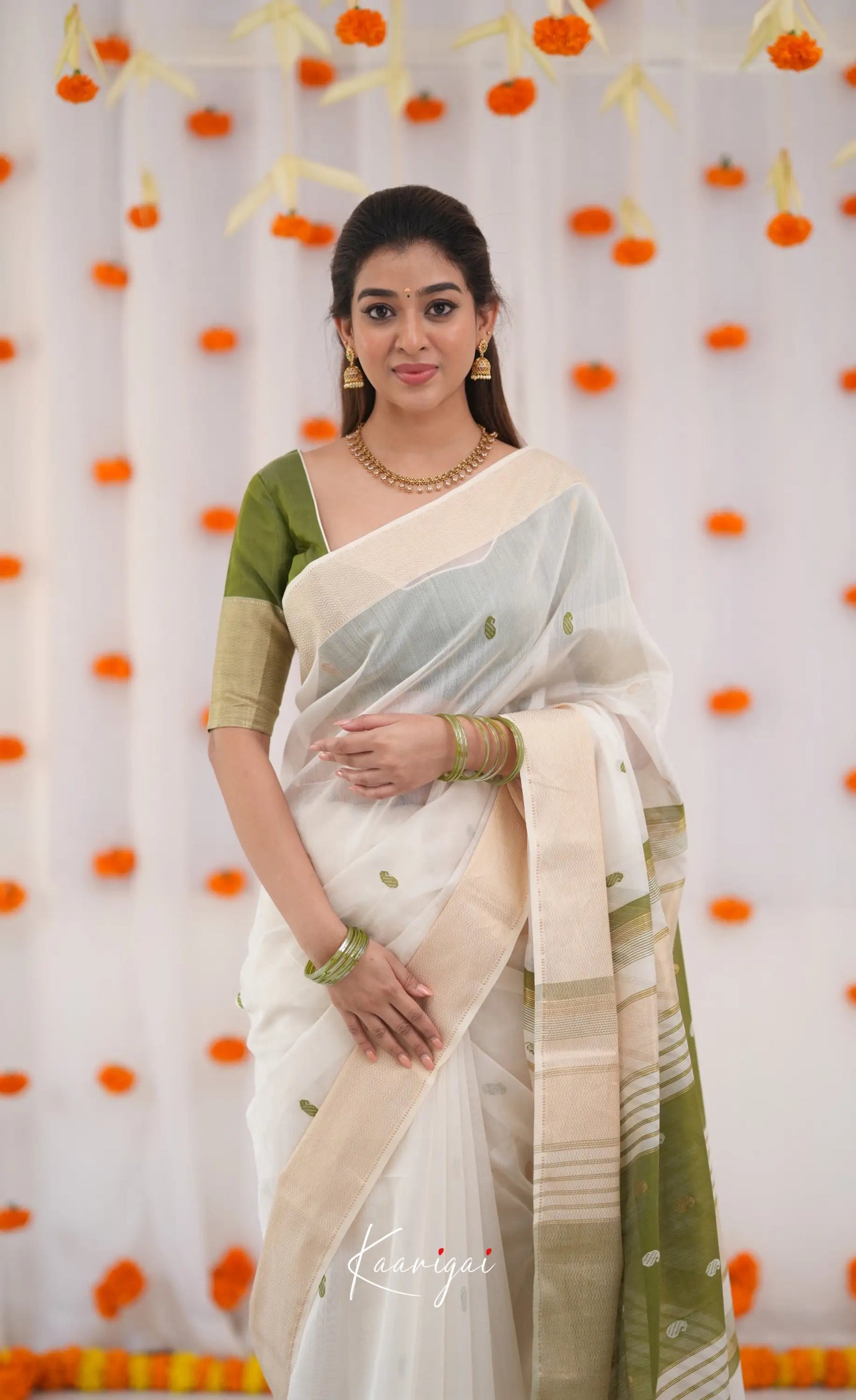 Maanvi Maheswari Silk Cotton Saree - White and Olive Green Sarees