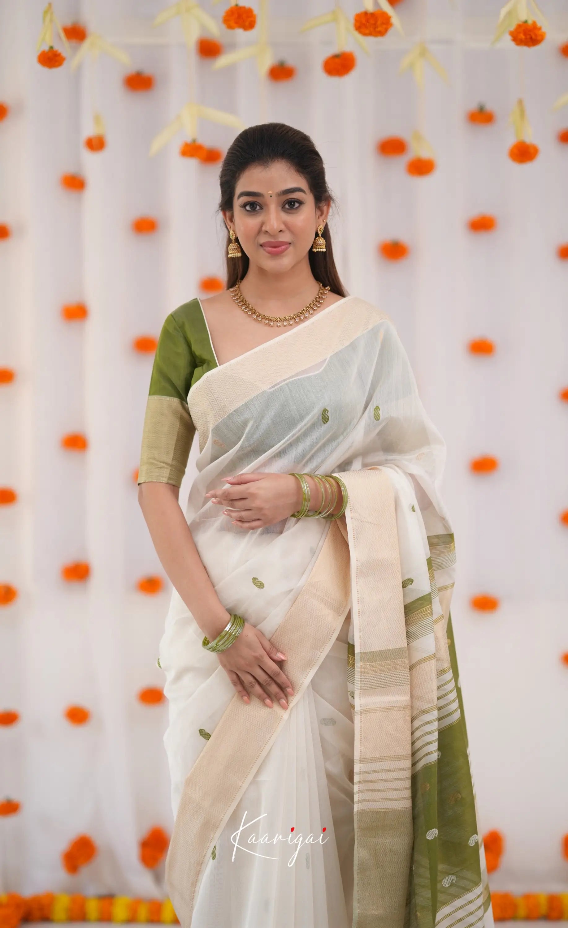 Maanvi Maheswari Silk Cotton Saree - White and Olive Green Sarees
