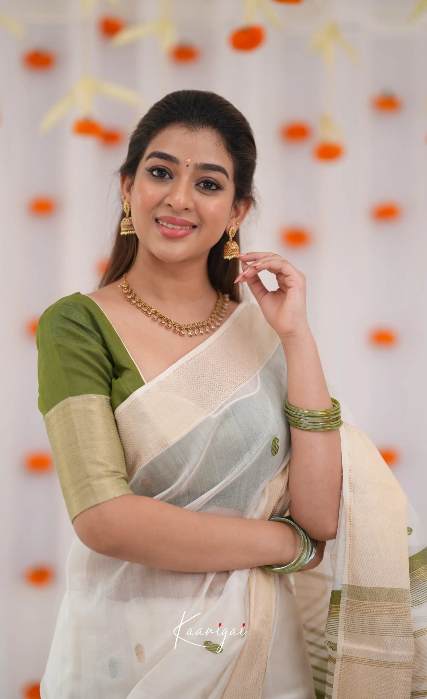 Maanvi Maheswari Silk Cotton Saree - White and Olive Green Sarees