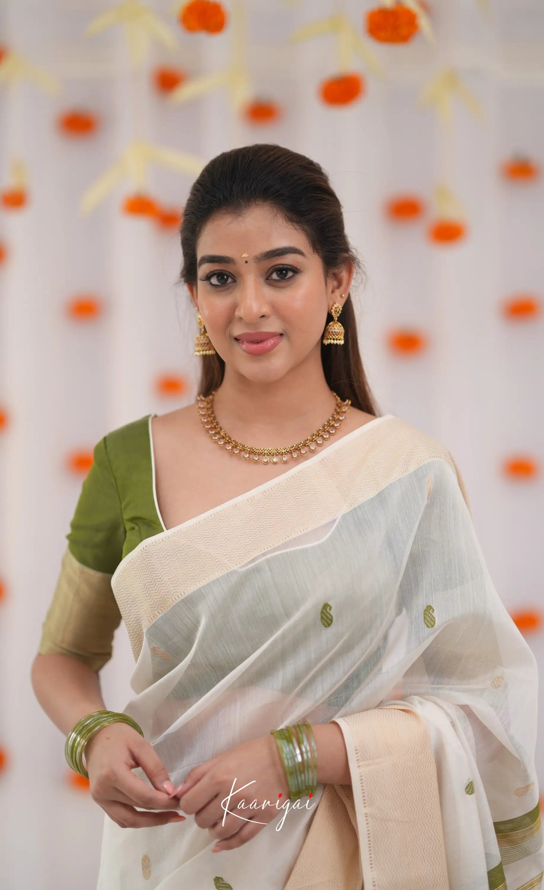 Maanvi Maheswari Silk Cotton Saree - White and Olive Green Sarees