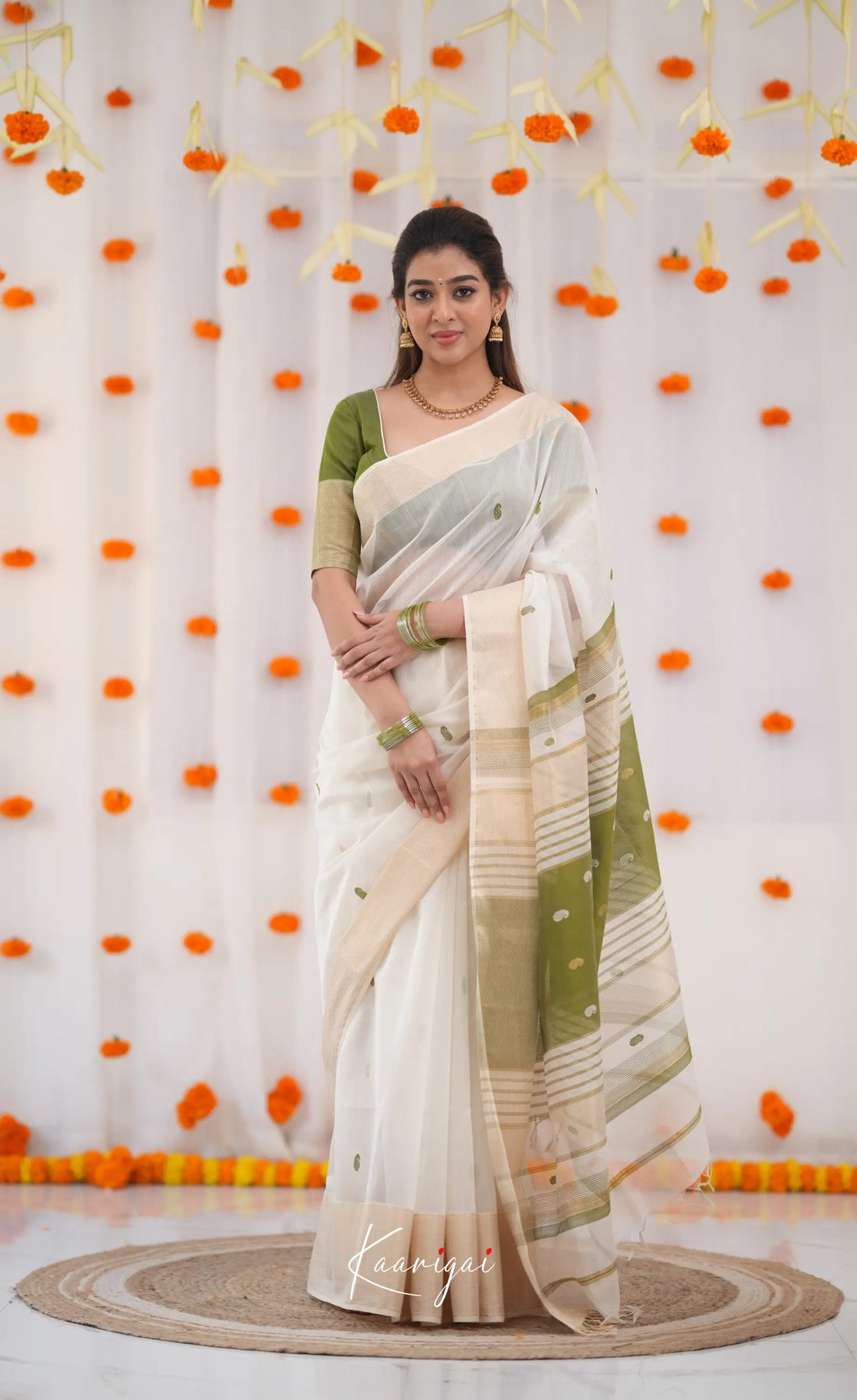 Maanvi Maheswari Silk Cotton Saree - White and Olive Green Sarees