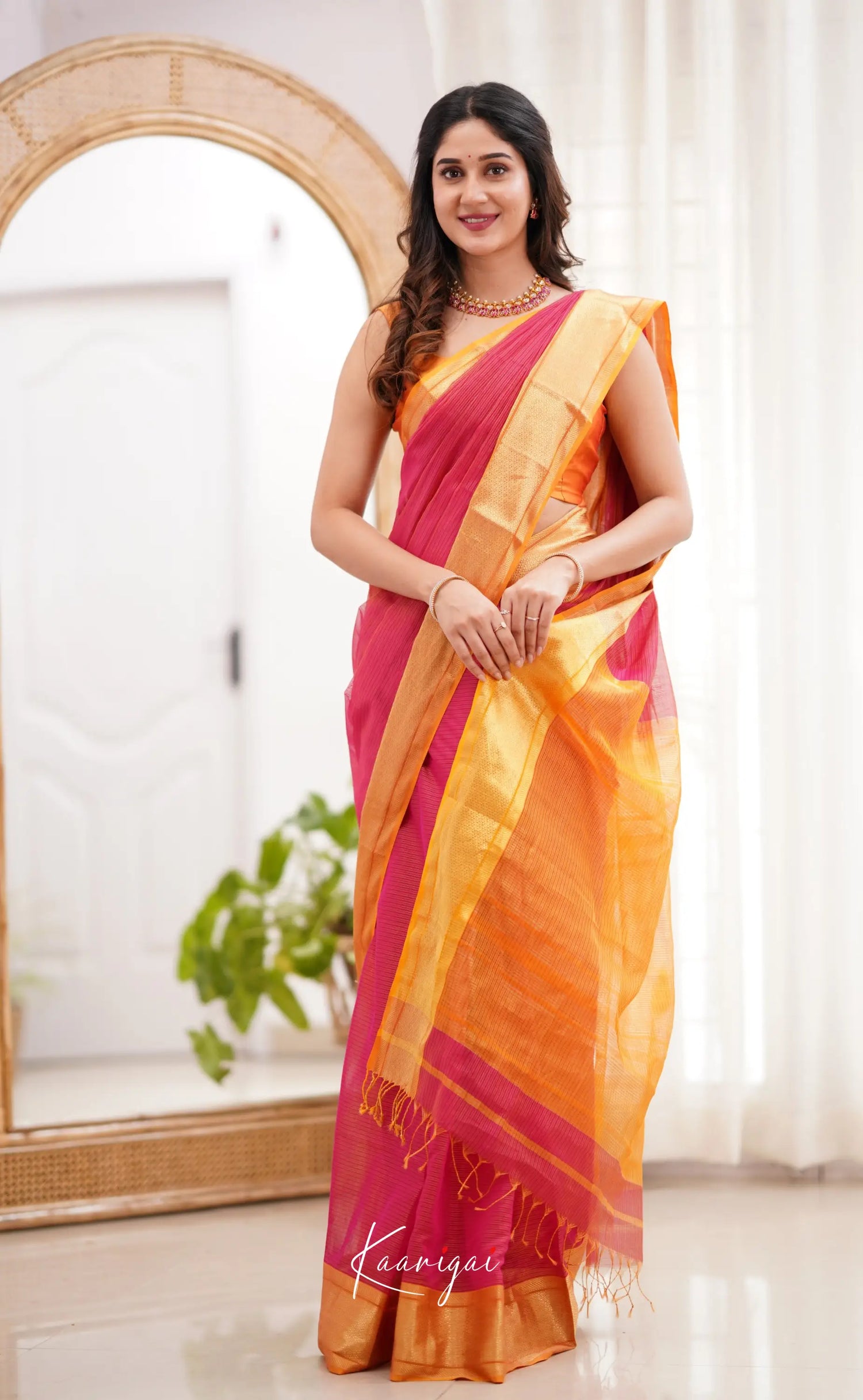 Maanvi- Pinkish Shade And Orange Tone Sarees