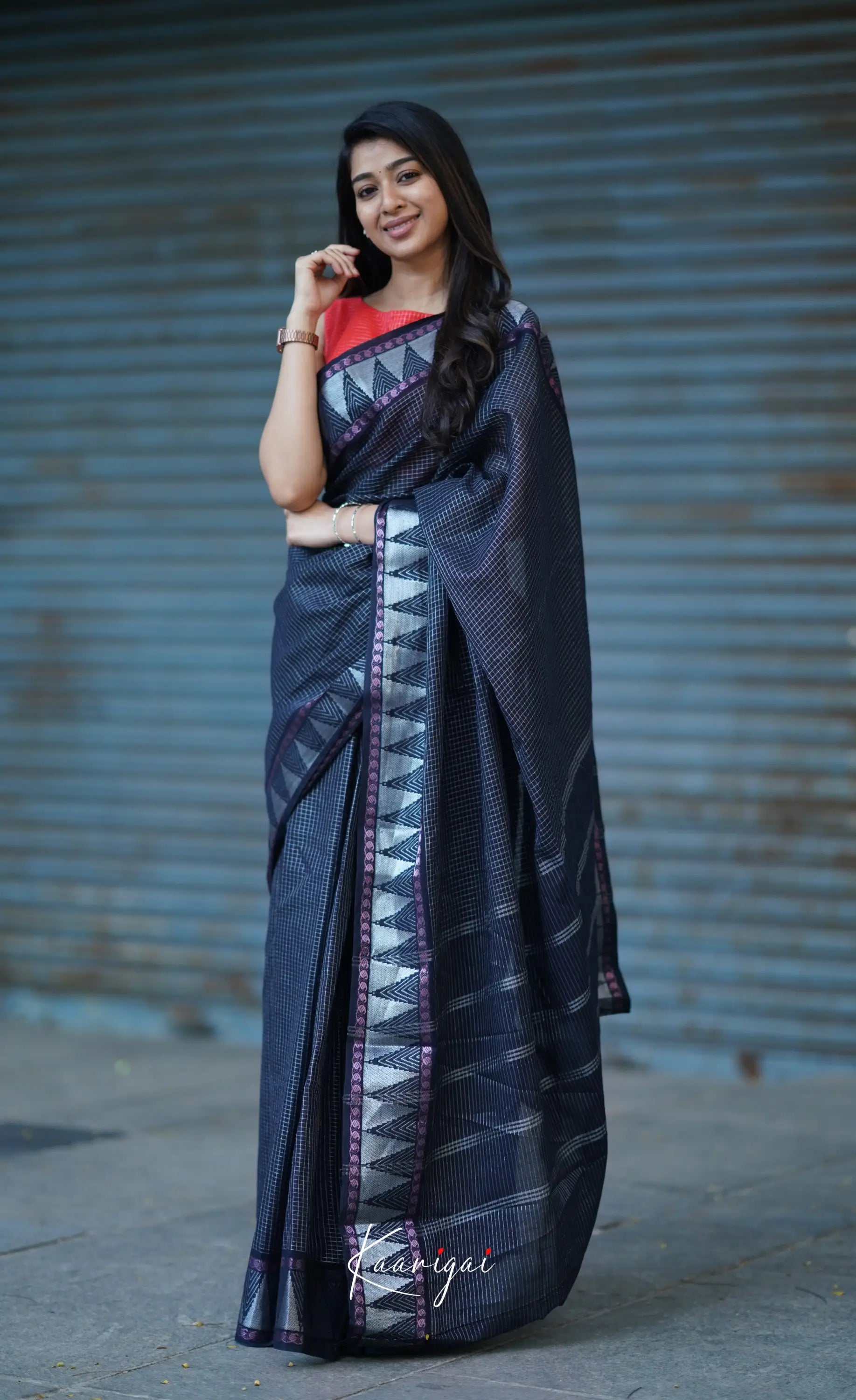 Saaral Black Shade And Orange Tone Sungudi Saree Sarees