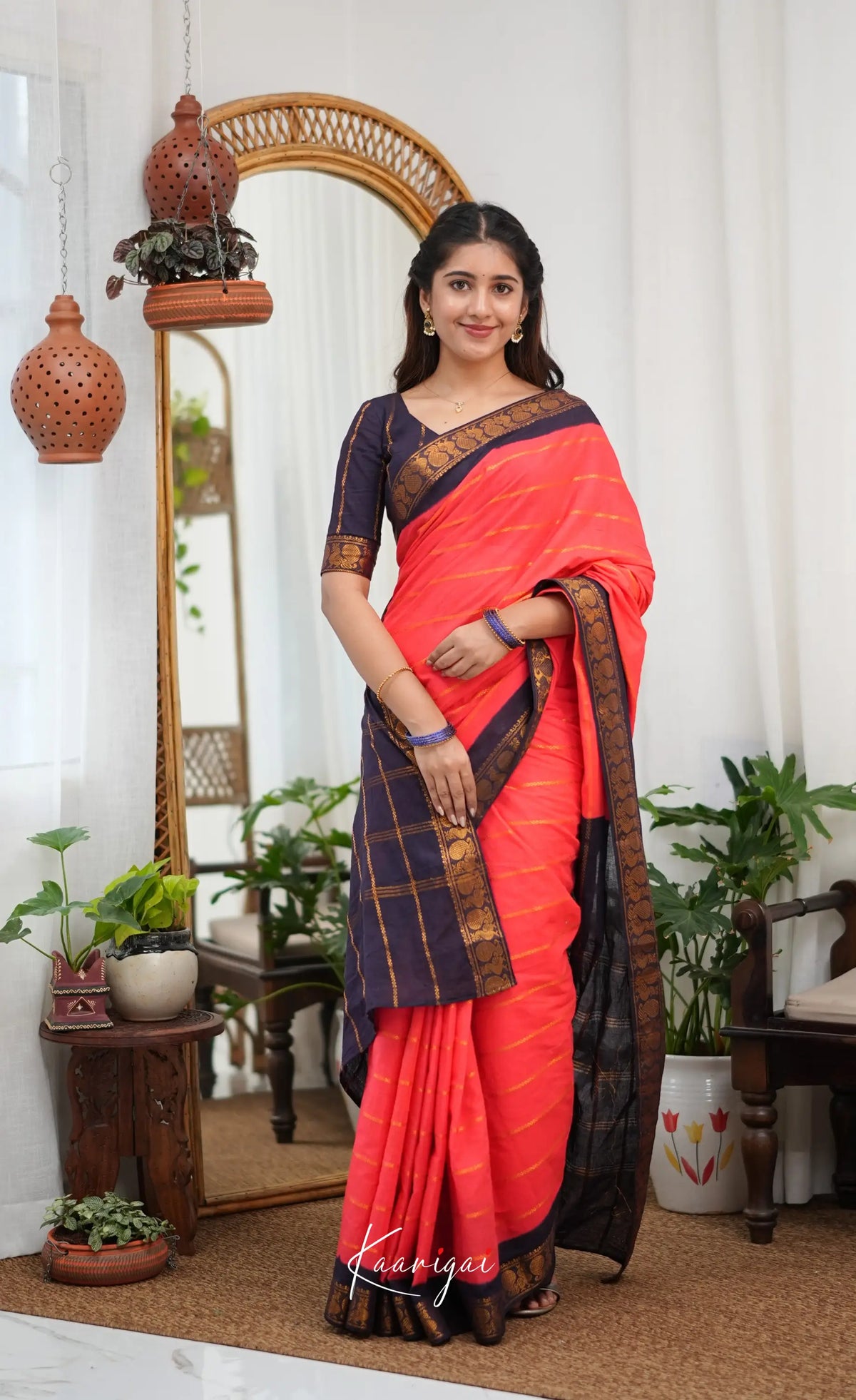 Saaral - Coral Orangish Pink and Dark Navy Blue Sungudi Saree - Sarees