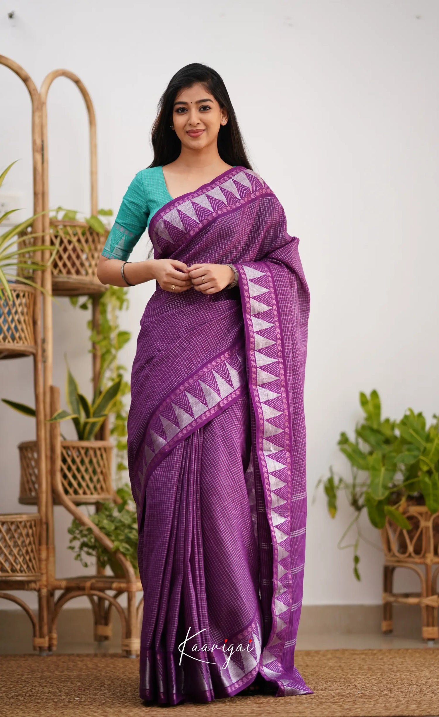 Saaral Dark Purple Shade And Teal Green Tone Sungudi Saree Sarees