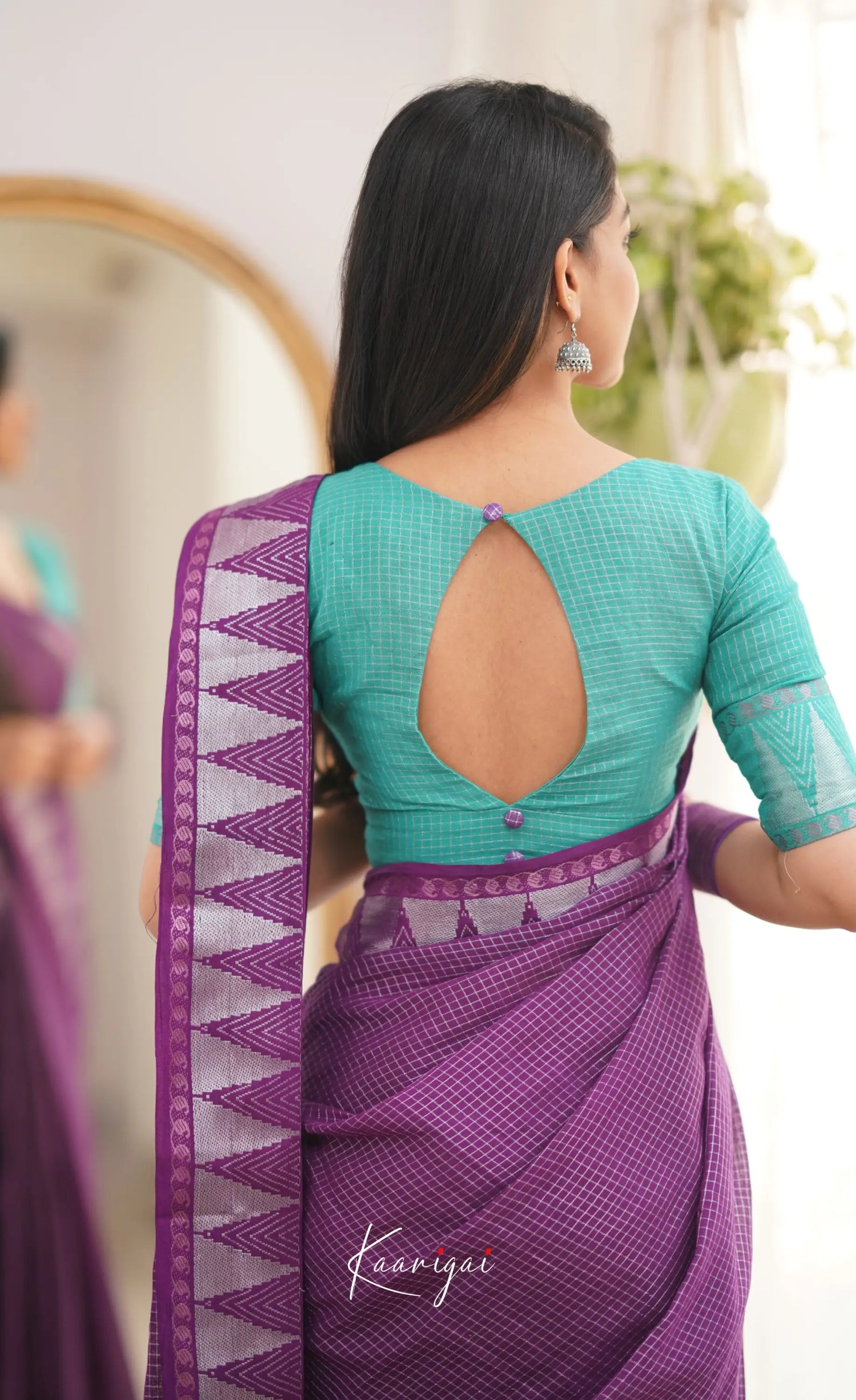 Saaral Dark Purple Shade And Teal Green Tone Sungudi Saree Sarees