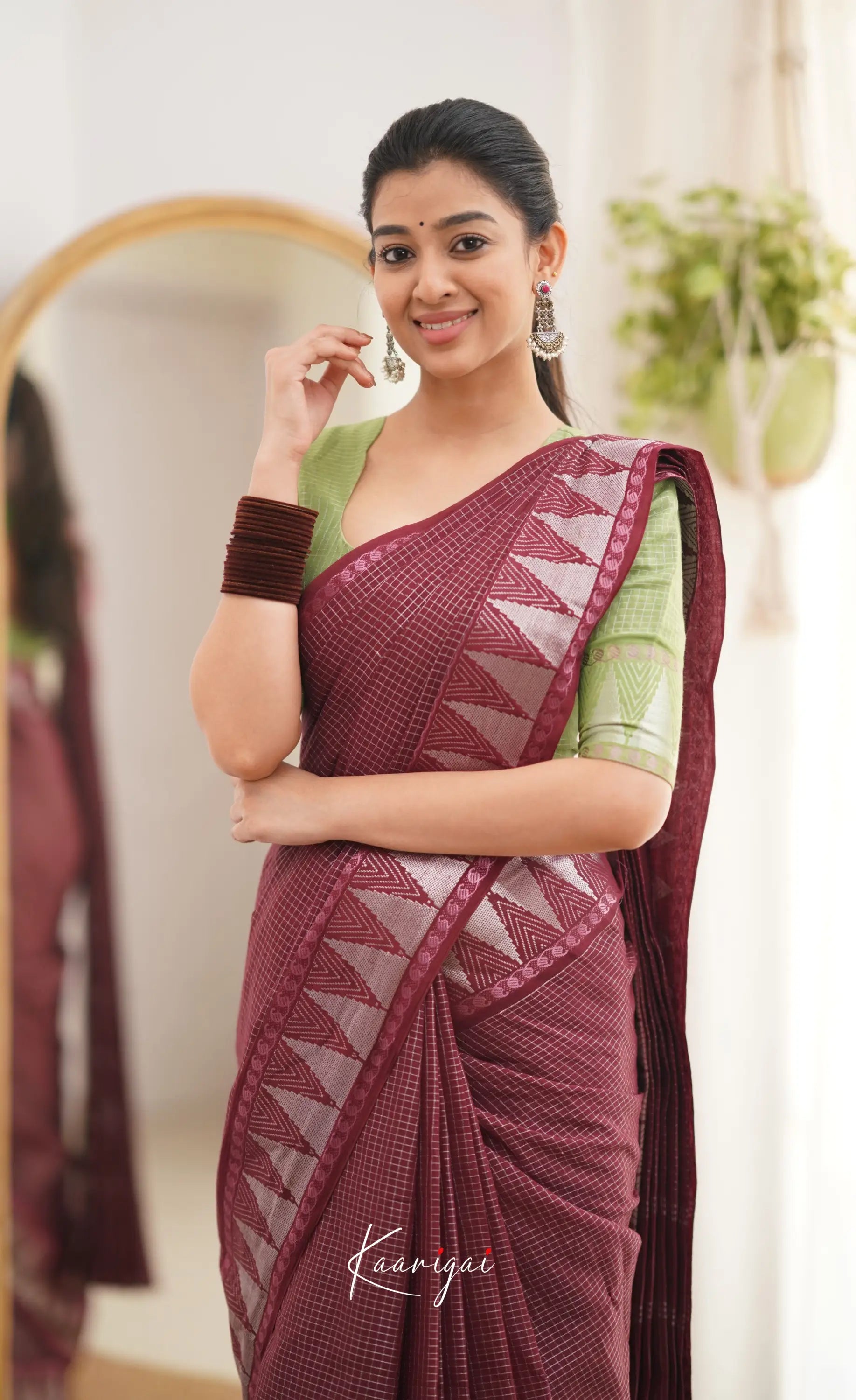 Saaral Maroonish Brown Shade And Pista Green Tone Sungudi Saree Sarees