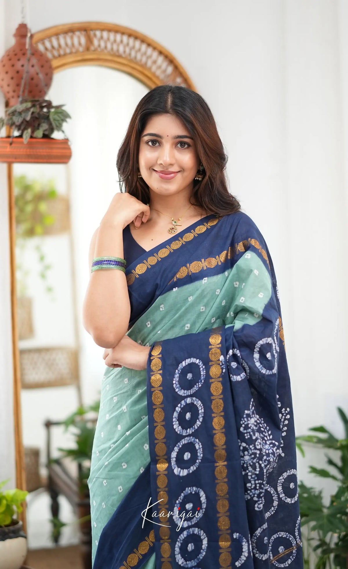 Saaral - Pale teal blue and Dark blue Sungudi Saree - Sarees