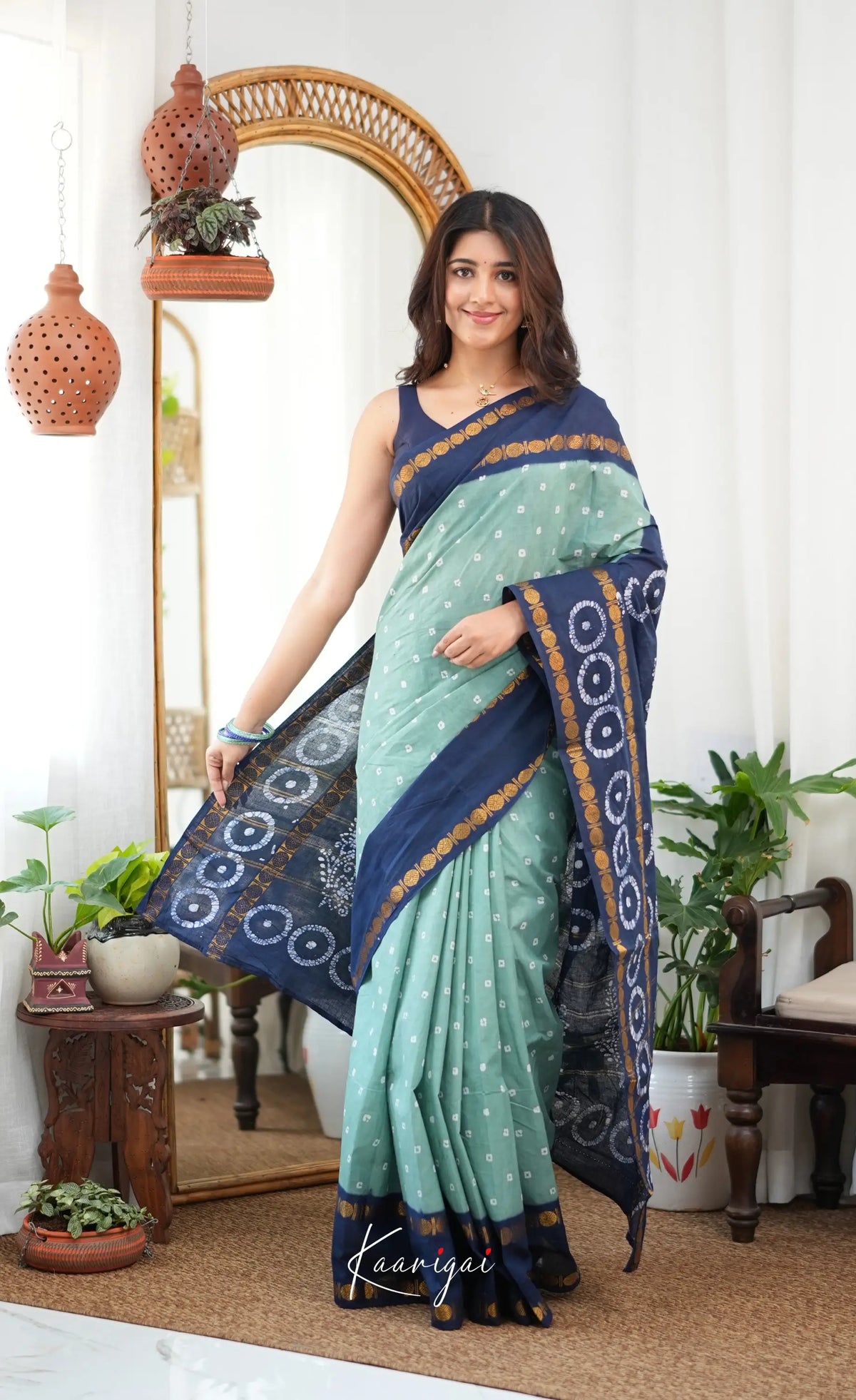 Saaral - Pale teal blue and Dark blue Sungudi Saree - Sarees