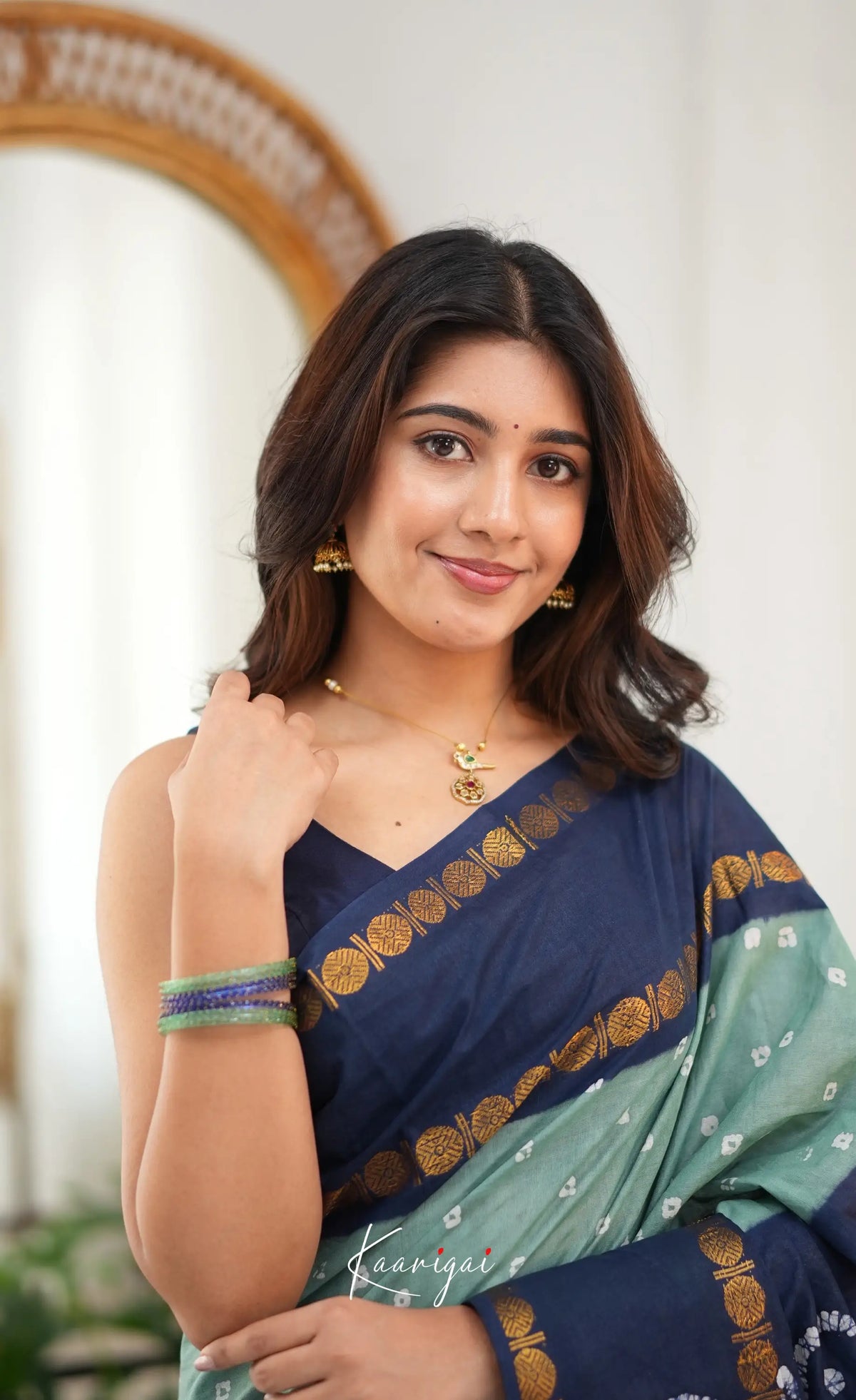 Saaral - Pale teal blue and Dark blue Sungudi Saree - Sarees