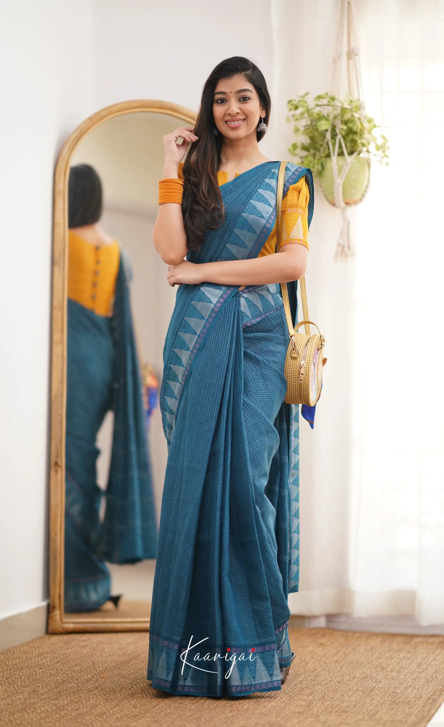 Saaral Peacock Blue Shade And Mustard Tone Sungudi Saree Sarees