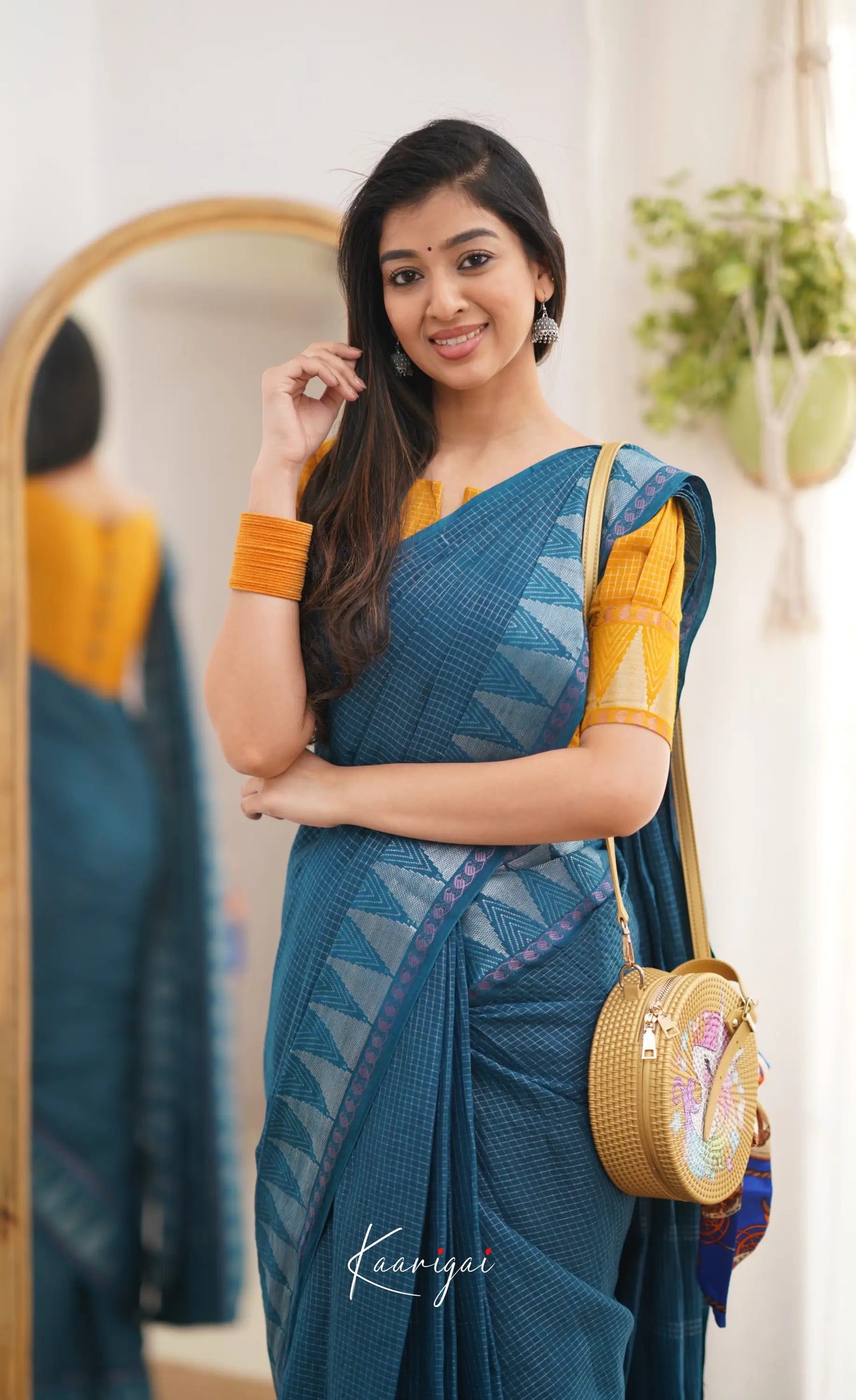 Saaral Peacock Blue Shade And Mustard Tone Sungudi Saree Sarees