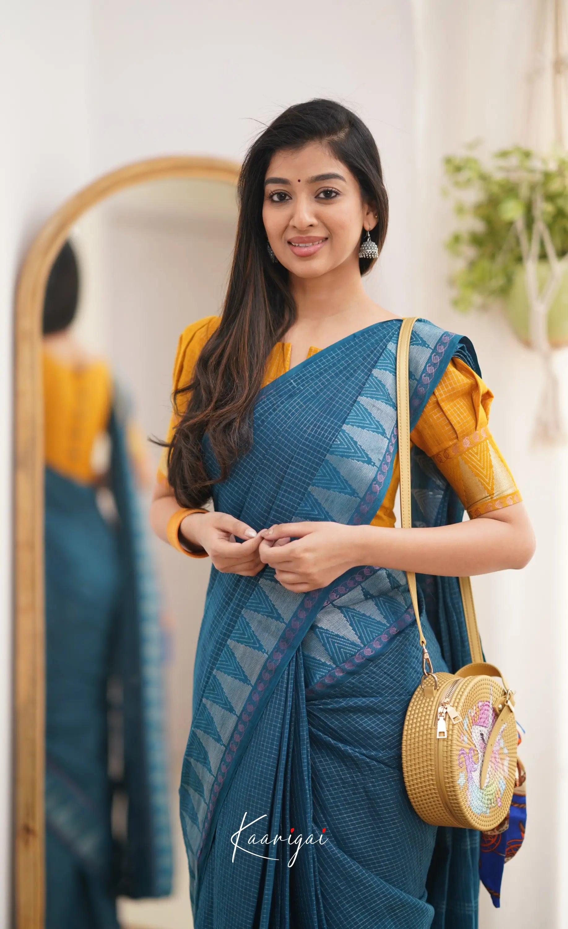 Saaral Peacock Blue Shade And Mustard Tone Sungudi Saree Sarees