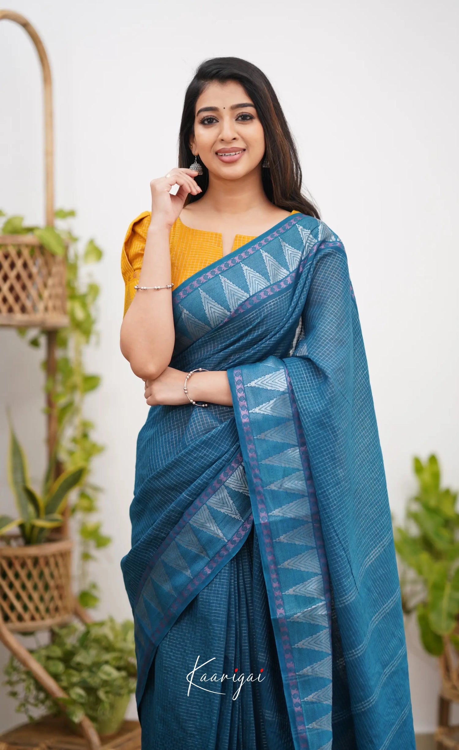 Saaral Peacock Blue Shade And Mustard Tone Sungudi Saree Sarees