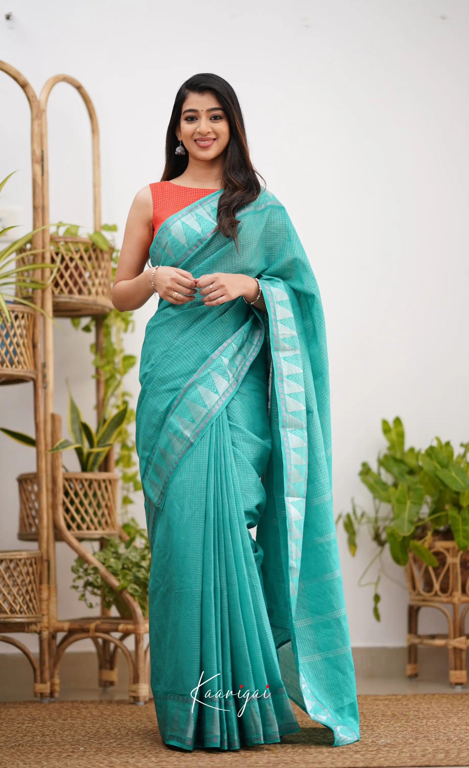 Saaral Teal Green Shade And Orange Tone Sungudi Saree Sarees