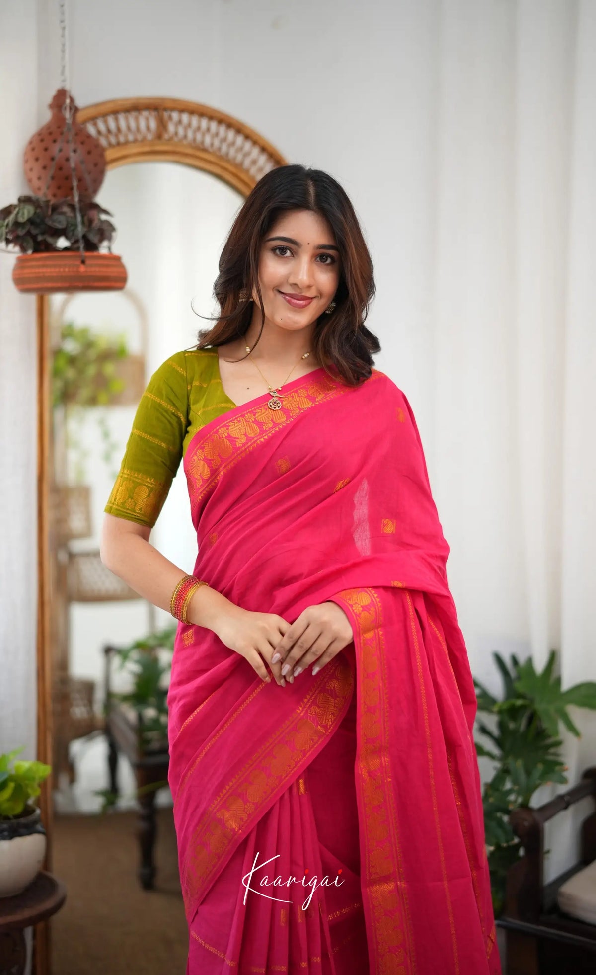 Saaral - Two-tone pink and Light green Sungudi Saree - Sarees