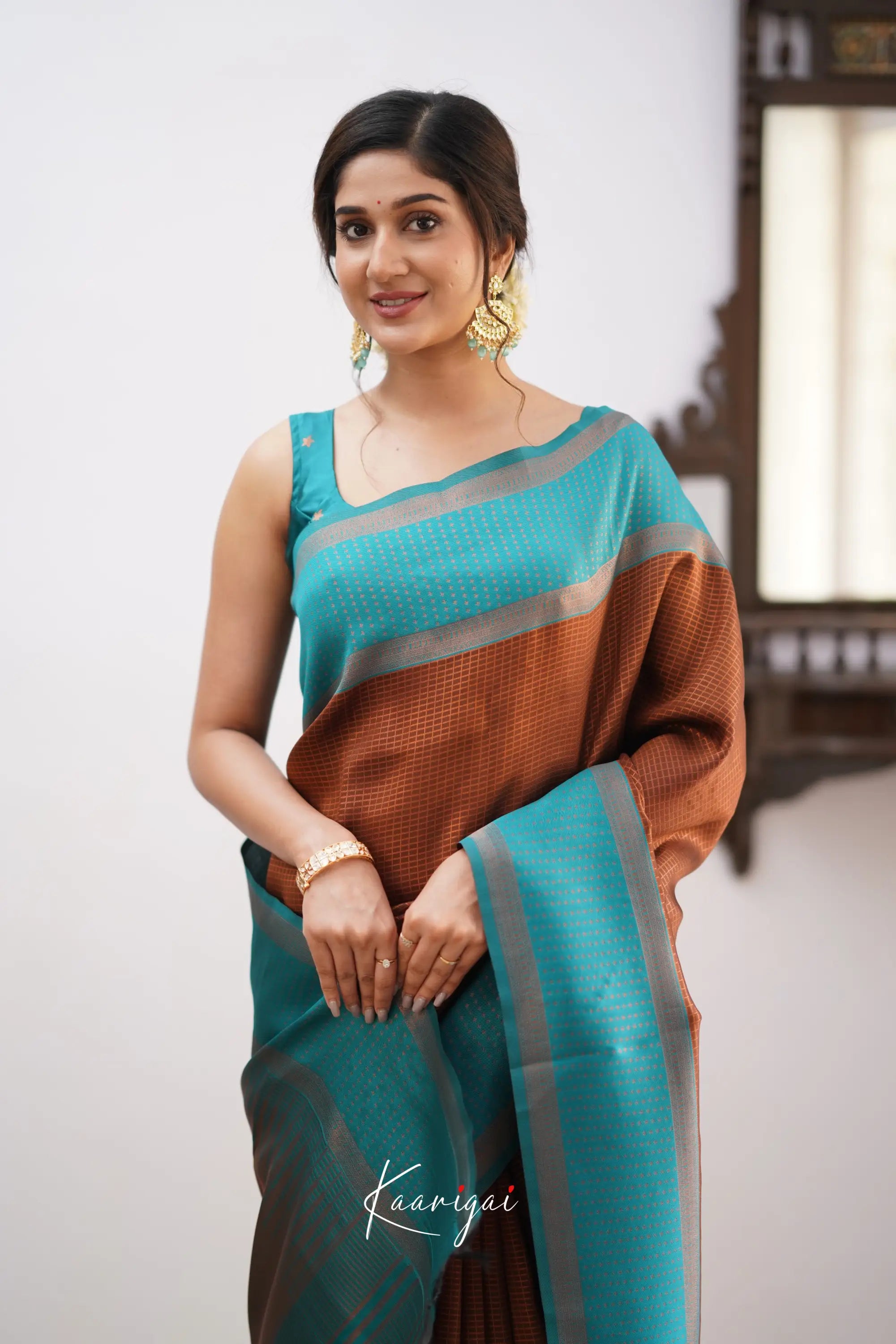 Sita - Brown And Teal Blue Semi Silk Saree Sarees