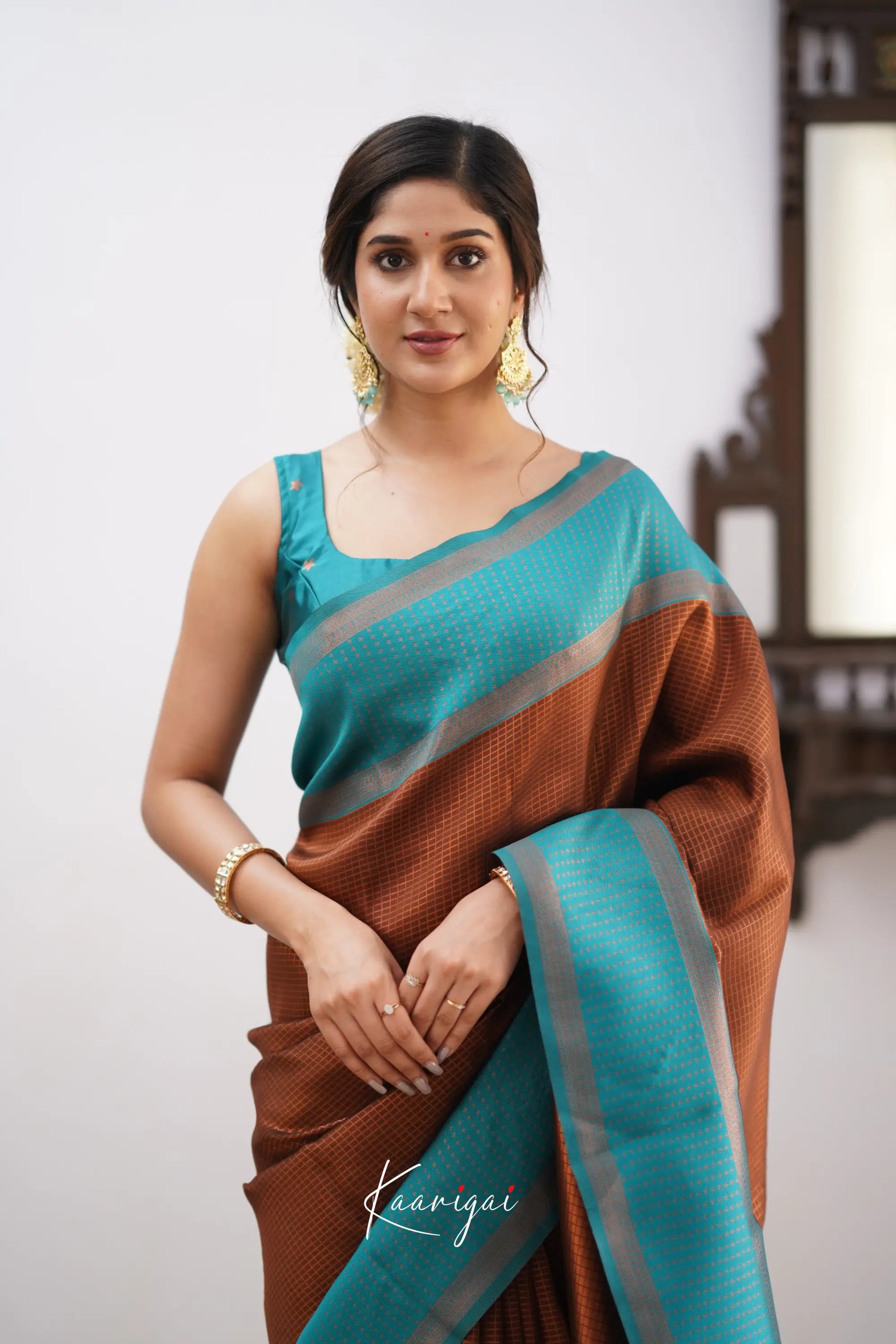 Sita - Brown And Teal Blue Semi Silk Saree Sarees